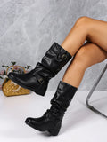 Amalia - Boots in schwarz mit Schnallen-Details und Slouch-Look für einen rustikalen Chic.