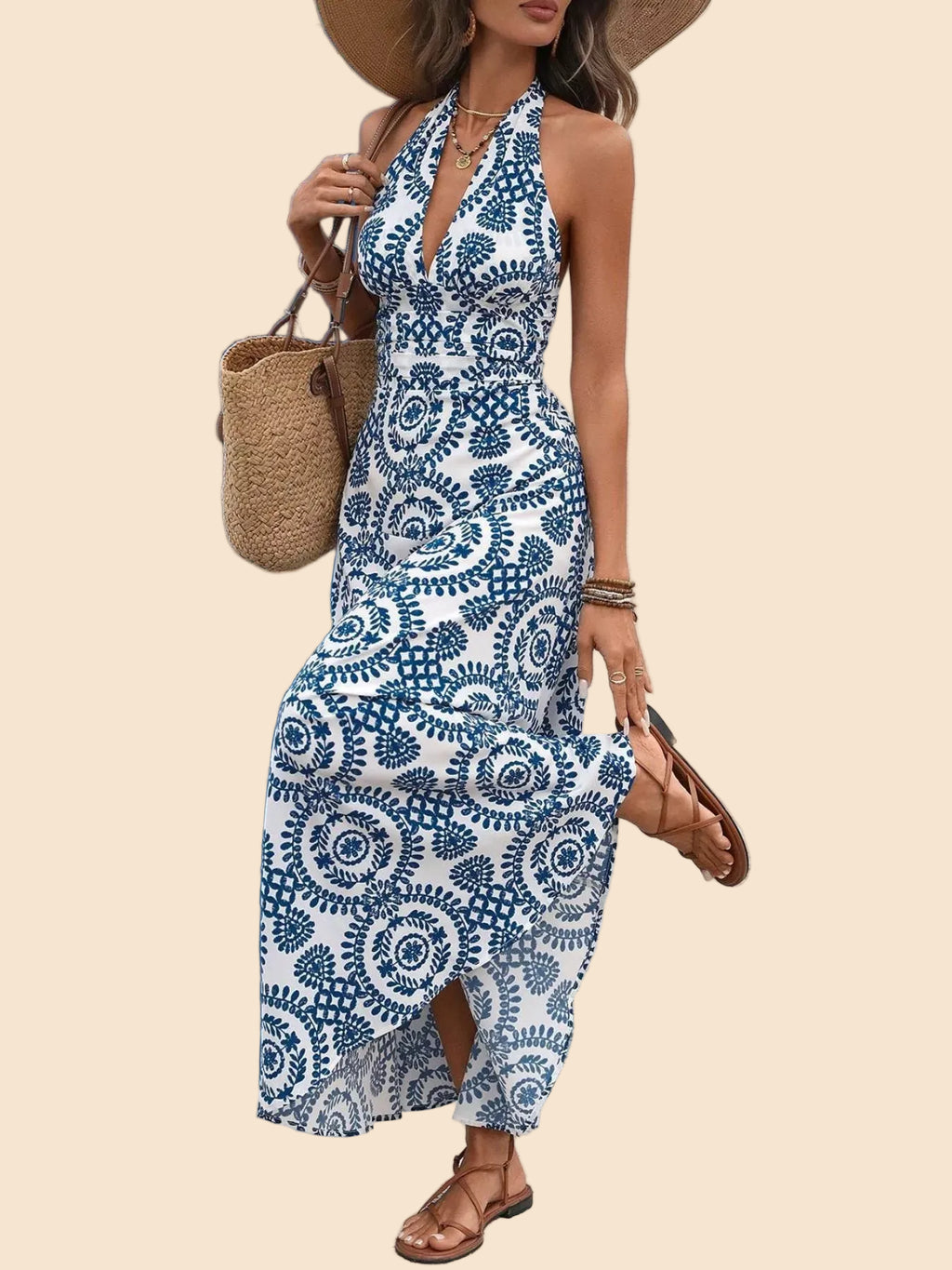 Weiß-blau gemustertes Maxikleid mit Neckholder-Ausschnitt und floralem Print. 🌿